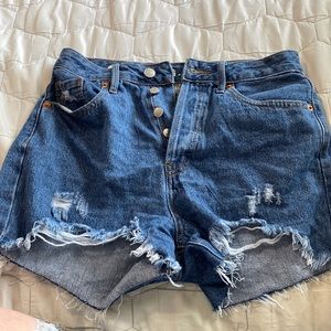 Ripped jean mom shorts